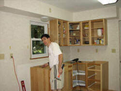 RF Cafe: Erie HQ - ze webmaster "engineering" the kitchen cabinet installation