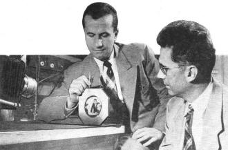 Dr. F. E. Williams (right) and D. A. Cusano demonstrate the amplification of light - RF Cafe