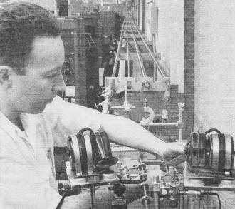 Bell Labs engineer tests transmission through the new wave guides of various sizes - RF Cafe